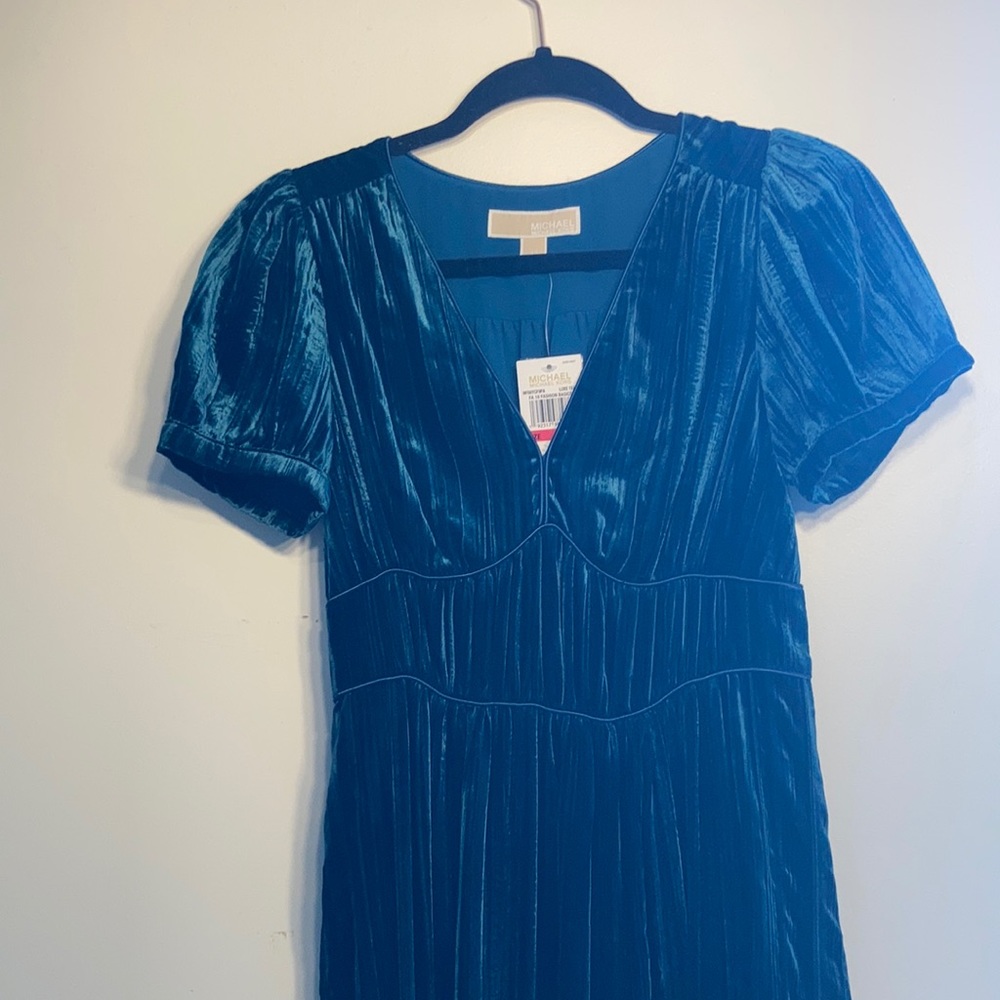 I bought this dress brand new but it’s too small